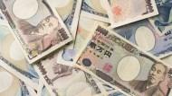日銀維持貨幣政策不變！日圓升至107、日經漲幅縮